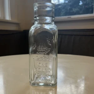 Five 1-pound Vintage Honey Acres Pure Honey glass bottles w/ corks